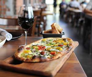 Flatbread with a glass of red wine