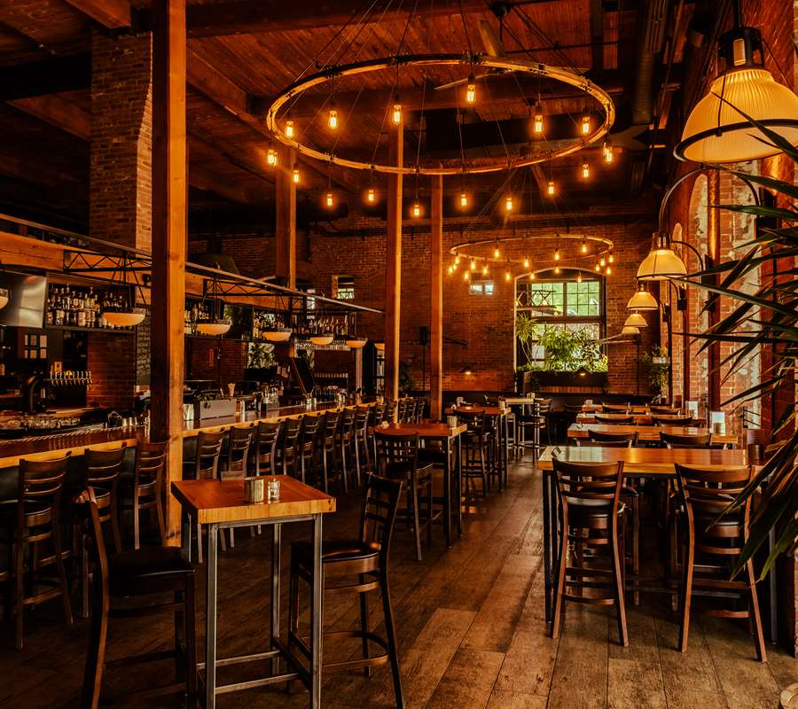 Waterworks' main bar and high-top seating is pictured without guests, prior to dinner service.