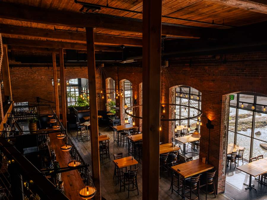 Waterworks main bar, lounge, and solarium dining room are viewed from above, in the loft.